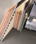 Close-up of Pro Grade Floor Cutter For Laminate And Vinyl With Quick Install Kit, showing various flooring materials it can cut.