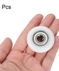 4 Pack 10X40X10mm Nylon Idler Bearings Double Shielded Chrome Steel Dead Silent Spin Pulley Wheels in hand