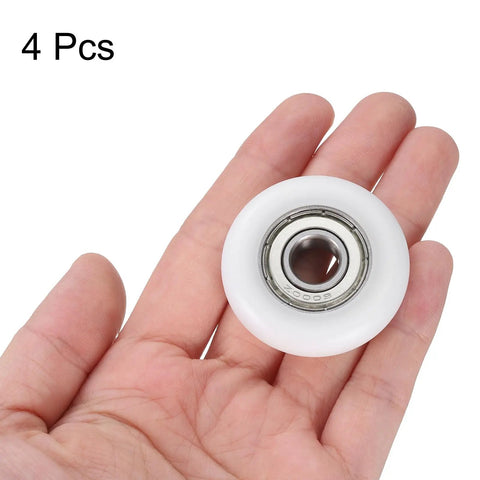 4 Pack 10X40X10mm Nylon Idler Bearings Double Shielded Chrome Steel Dead Silent Spin Pulley Wheels in hand