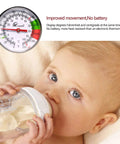 Instant Read 2-Inch Dial Thermometer for Coffee Drinks and Milk Foam pictured above baby with bottle.