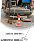 Heavy Duty 12mm Stainless Steel T Shape Manhole Cover Lifter Hook With Thick Handle For Drain Grate And Rolling Shutter Removal in use near a truck.