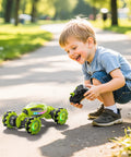 Child enjoying gesture control RC stunt car with remote