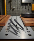 Tough As Nails 3 Piece High Carbon Steel Center Punch Set on workbench, showing sizes: 2.0mm, 1.5mm, and 3.0mm.