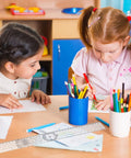 Two children using a Straight Up Best Two Piece Clear Plastic Goniometer Set With Nifty Seven Inch Flexible Arms And Trustworthy Angle Finding Protractor Ruler For Homework And Man Cave Projects at a desk.