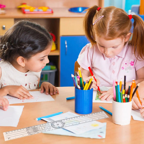 Two children using a Straight Up Best Two Piece Clear Plastic Goniometer Set With Nifty Seven Inch Flexible Arms And Trustworthy Angle Finding Protractor Ruler For Homework And Man Cave Projects at a desk.