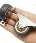 Four Pack 2 Inch Fixed Caster Wheels With Low Profile Design For Furniture Non Swivel For Precise Straight Line Rolling showing TPE wheels and steel bracket.