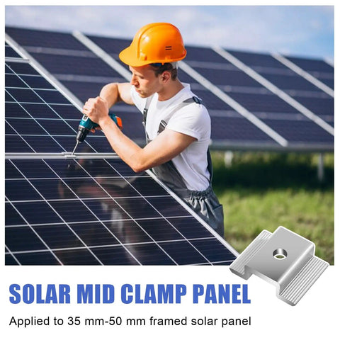 Worker installing solar panels using Bulk 42 Pack Aluminum Solar Panel Mid Clamps For Mounting On Tin Roof Flat Roof And Sheet Roofs.