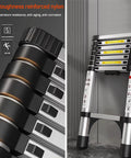 Telescoping Aluminum Ladder 12.5 Feet With Non Slip Feet Portable Collapsible Extension Ladder For Home Roof Loft RV Use EN131 Certified 330 Pound Weight Capacity, folded compactly against wall.