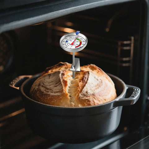 Candy Thermometer With Pot Clip, 9-Inch Long Probe inserted into bread in a pot inside an oven