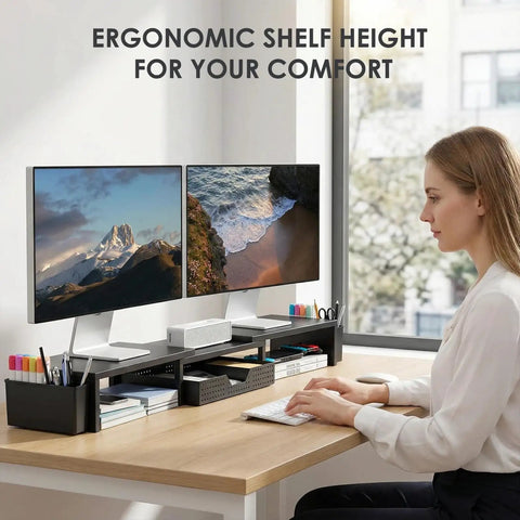 Woman using dual monitor stand riser with drawer and pen holders, metal desk organizer for office, computer shelf and racks, black