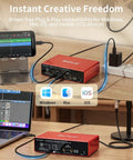 Compact red 2x2 24 Bit 192 KHz audio interface with XLR and TRS combo input, USB-C connection, setup with PC, Mac, iOS.