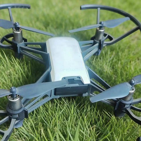 Drone Battery Replacement Kit 1100mAh 3.8V Li-Po For DJI Tello And Tello EDU RoboMaster TT in a grassy field