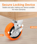 Close-up of orange six inch industrial caster with dual ball bearings and brakes under cabinet showing lock/unlock feature.