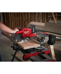 Using Top Tier Dual Bevel Sliding Compound Miter Saw With Brushless Powerplant Ten Inch Cutting Capacity in a workshop.