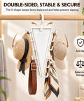 Double Sided Closet Hanger With 360 Degree Slick Spin High Capacity Rotating Rack Featuring Twelve Tangle Free Hooks To Keep Your Favorite Threads On Point And Maximize Storage Space Pack Of Four with hats and accessories hanging.