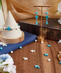 200 Pcs White Cross Beads And Blue Stone Beads Bulk 8mm Round Synthetic Turquoise displayed with jewelry examples