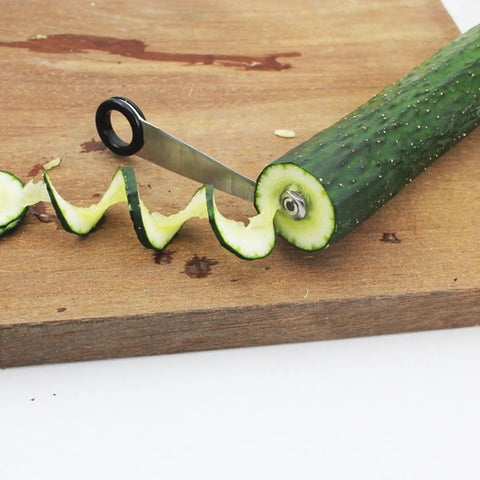 Awesome 2 Piece Spiral Cutter And V Shape Carving Tool Set For Potatoes Cucumbers Carrots And Fruit Stainless Steel in use on cucumber