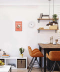 Retro Rugged Cat Eating Ramen Metal Sign 8x12inch Tin Poster in a modern kitchen dining area.