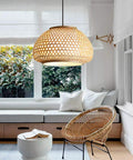 Handmade Flush Mount Ceiling Light With Retro Bamboo Dome Shade illuminating a cozy dining space with natural light and warm ambience.