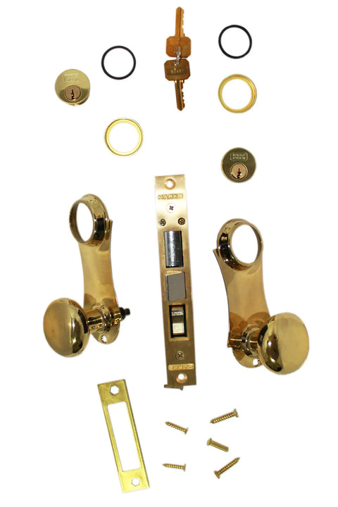 Beefy Double Cylinder Iron Gate Mortise Lock Set with Ornamental Knob Plate and 2 Point 5 Inch Backset Left Hand Reverse Polished Brass Finish 1 Inch Deadbolt and 1 Inch Face Plate displayed with all components and fixings.