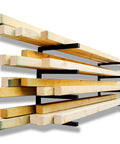 Heavy Duty Wall Mounted Lumber Rack With Rock Solid Four Level Metal Shelf For Garage And Workshop Mega 800 Pound Capacity Black Steel, holding wooden boards.