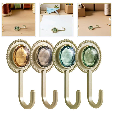 Slick Four Pack Adhesive Wall Hooks For Hanging Towels And Robes With Knockout Grip No Drilling Required Super Quick Mount For Bathroom Kitchen Or Entryway Storage, featuring colorful jewels.