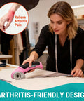 Woman using Cordless Electric Scissors With Safety Lock, The Ultimate Mini Rotary Cutter For Cardboard, Leather, Felt, Fabric, Rug, Vinyl, Paper And More, 4.2V Portable Shears In Pink