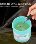 Low Residue Flux Solder Paste For CSP BGA PCB Repairs 100g Solder Compound in turquoise jar with a soldering iron