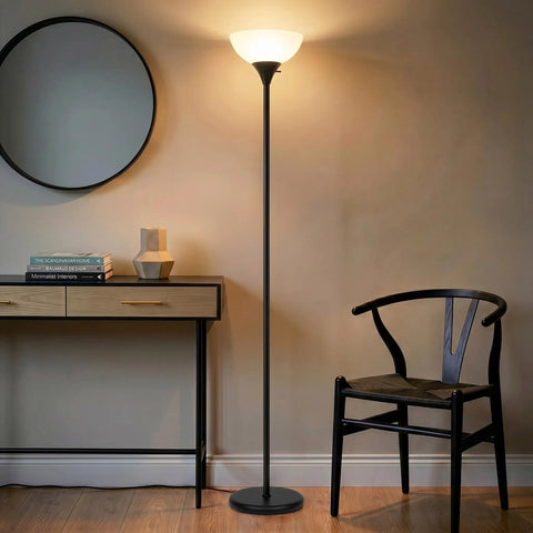 Sky Dome Dimmable LED Floor Lamp For Living Room, Bedroom Or Office In Jet Black Finish, illuminating a cozy corner with warm light.