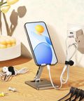 Cord Organizer And Cable Ties Set With Super Handy Magnetic Clips holding cables on desk near smartphone stand