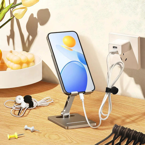 Cord Organizer And Cable Ties Set With Super Handy Magnetic Clips holding cables on desk near smartphone stand