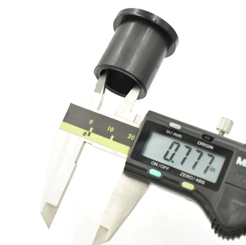 Digital caliper measuring a bushing for Beefed Up Front Wheel Bearing Rebuild Kit For Two Front Wheels With Complete Hardware.