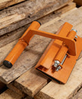 Rock Solid Heavy Duty Lifter Tool For DIY Pros And Construction Crews Auto Adjusting Jaw Works From 11 Mm To 21 Mm Fits Any Slab Easy Grip Handle on wooden slabs.
