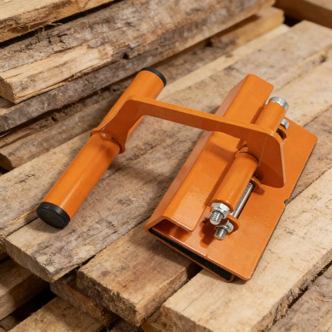 Rock Solid Heavy Duty Lifter Tool For DIY Pros And Construction Crews Auto Adjusting Jaw Works From 11 Mm To 21 Mm Fits Any Slab Easy Grip Handle on wooden slabs.