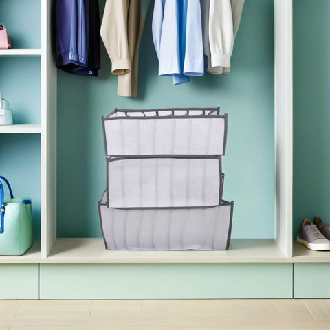 Total Closet Game Changer 3 Pack Seven Grid Foldable Bins With Grippy Handles Ultra Spacious Storage Boxes in closet.