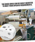 White cabinet door hinge damping mechanism on a factory assembly line; inset close-up of the unit.
