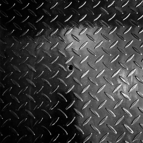Close-up of textured surface on NTEP Certified Legal For Trade Floor Scale Built For Heavy Duty Industrial Shipping And Pallet Tasks With Indicator 10,000 Pound Capacity And 2 Pound Accuracy Large 48 By 60 Inch Platform For Easy Weighing.