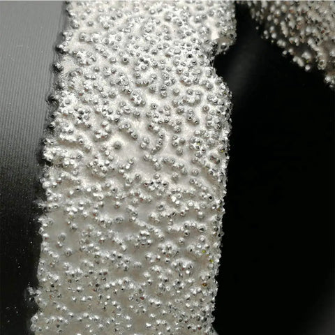 Close-up of vacuum brazed diamond grit on drill bit from Diamond Core Drill Bits Set For Porcelain Tile Stone And Brick Dry And Wet Drilling Vacuum Brazed Hole Saws 6 Piece Sizes 25 38 51 65 76 89mm Built Tough And Lasting.