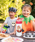 Children with 16 oz kids sublimation tumblers sippy cups decorated for Halloween, highlighting 5 Pack 16 Oz Kids Sublimation Tumblers Sippy Cups With Leak Proof Stainless Steel Blank Water Bottles For DIY Heat Press Printing Craft Gifts Great For Kids Art Projects.
