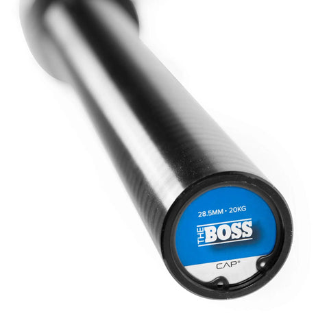 Close-up of the Elite Seven Foot Olympic Weight Bar Built Different With Stainless Spin Sleeves and Aggressive Knurling for lifters.