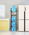 2 In 1 Five Gallon Water Jug Holder With Five Tier Stand And One Dispenser Valve beside kitchen fridge