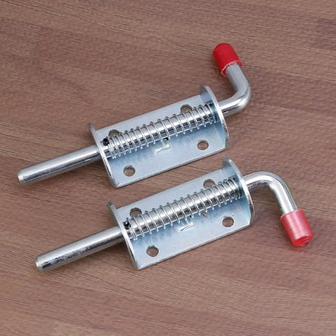 Premium Stainless Steel Spring Loaded Gate Latch And Bolt Hardware Set For Utility Dump Trailers Barn Doors showing two latch bolts on wood background.