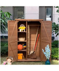 Massive Outdoor Storage Cabinet Crafted From Top Shelf Natural Cedar For Yard Gear And Hand Tools Weather Resistant Structure with tools and balls.