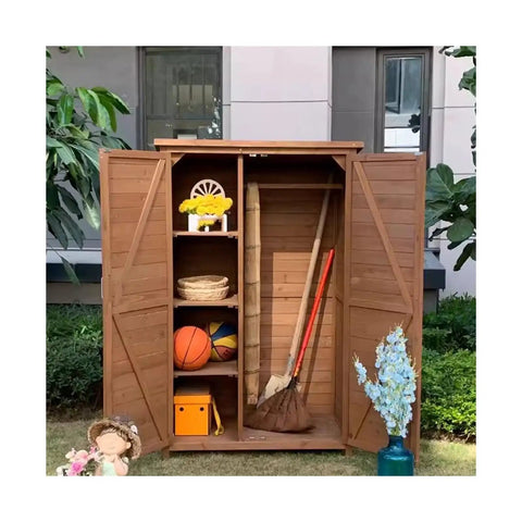 Massive Outdoor Storage Cabinet Crafted From Top Shelf Natural Cedar For Yard Gear And Hand Tools Weather Resistant Structure with tools and balls.