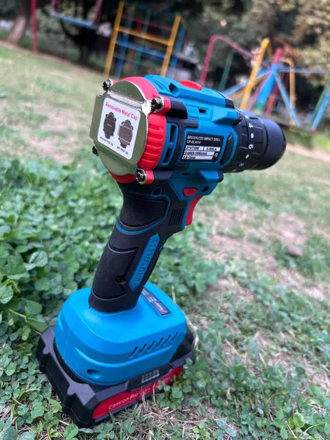 Heavy Duty Cordless Drill Driver With Ten Speed Torque Settings And Included Battery resting on grass, showcasing ergonomic grip and removable metal cap.