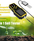 7 In 1 Handheld Soil Tester Kit With NPK And pH, Temperature, Moisture, And Conductivity EC Meter displayed with growing plants
