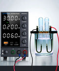 Pro Grade DC Bench Power Supply 0 To 30V 0 To 10A with encoder knobs and digital display connected to glass container
