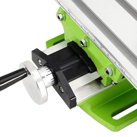 Close-up of 12.2 Inch Mini Milling Machine Worktable With Compound Drilling Slide Table showing the adjustable dial and green base.