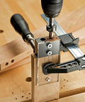 Rock Solid One Quarter Inch Dowel Drilling Jig Kit With Hardened Steel Bore Guides And Clear Acrylic Base for precise drilling.