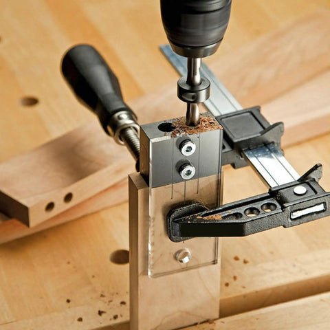 Rock Solid One Quarter Inch Dowel Drilling Jig Kit With Hardened Steel Bore Guides And Clear Acrylic Base for precise drilling.